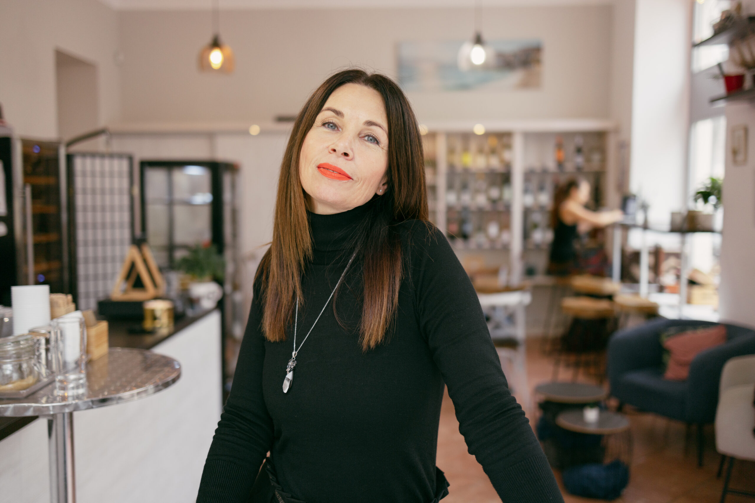 Business portrait of woman in a cafe